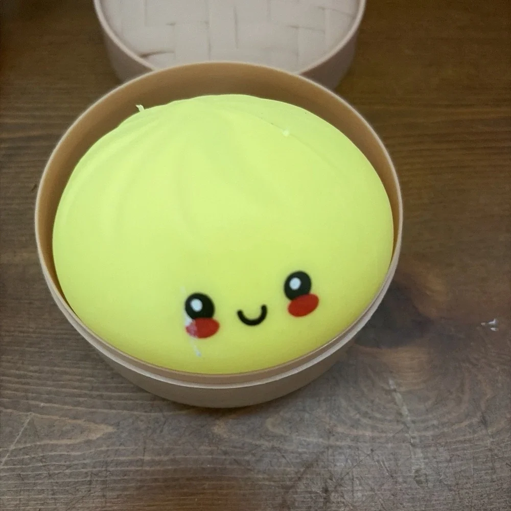 A set of 2 !!! Mystery Dumpling Squishy Bun Viral NEW Sealed Teal & Yellow